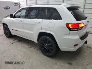 2022 Jeep Grand Cherokee WK Laredo X with VIN 1C4RJEAG1NC128279, listed as a Copart auction lot 70806244 with 104,478 mi miles and Salvage Title. Bid and sale history available at carsss.com. Image 2.