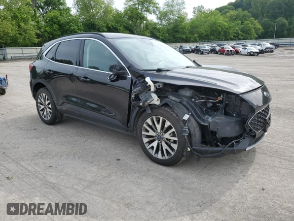 2021 Ford Escape Titanium with VIN 1FMCU9J97MUA57521, listed as a Copart auction lot 58714055 with 83,201 mi miles and Salvage title. Bid and sale history available at DreamBid. Image 4.