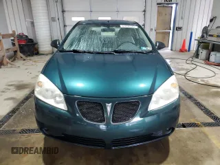 2006 Pontiac G6 GT z VIN 1G2ZH158664165013, wystawiony jako Copart lot #51258125 z przebiegiem 71 387 mil mil oraz Szkoda całkowita • Salvage title. Historia ofert i sprzedaży dostępna na DreamBid. Obrazek 5.