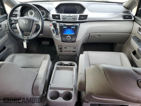 2014 Honda Odyssey Touring with VIN 5FNRL5H93EB034263, listed as a Copart auction lot 57254485 with 150,084 mi miles and Salvage title. Bid and sale history available at DreamBid. Image 8.