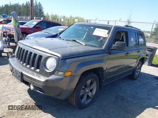 2014 Jeep Patriot Latitude with VIN 1C4NJPFA5ED928074, listed as a IAAI auction lot 42035754 with 155,636 mi miles and . Bid and sale history available at carsss.com. Image 2.