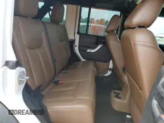 2016 Jeep Wrangler Unlimited Rubicon с VIN 1C4BJWFGXGL349057, выставлен на аукционе Copart как лот 61608945 с пробегом 118 200 миль миль и Списание • Salvage title. История ставок и продаж доступна на DreamBid. Изображение 11.