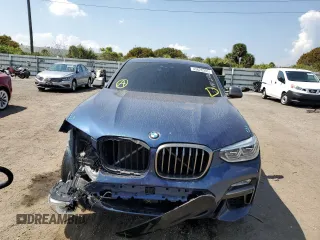 2019 BMW X4 M40i with VIN 5UXUJ5C57KLJ62744, listed as a Copart auction lot 43628303 with 31,448 mi miles. Bid and sale history available at carsss.com. Image 5.
