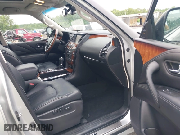 2016 Infiniti QX80 z VIN JN8AZ2NC0G9403107, wystawiony jako IAAI lot #42232384 z przebiegiem 98 763 mil mil oraz . Historia ofert i sprzedaży dostępna na DreamBid. Obrazek 5.