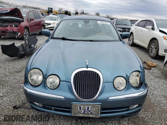 2000 Jaguar S-Type V6 z VIN SAJDA01C1YFL38878, wystawiony jako Copart lot #44323075 z przebiegiem 231 855 mil mil oraz Szkoda całkowita • Salvage title. Historia ofert i sprzedaży dostępna na DreamBid. Obrazek 5.