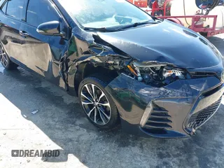 2019 Toyota Corolla L z VIN 5YFBURHE2KP897493, wystawiony jako IAAI lot #42052106 z przebiegiem 100 303 mil mil oraz . Historia ofert i sprzedaży dostępna na DreamBid. Obrazek 6.