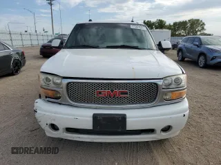 2005 GMC Sierra Denali z VIN 2GTEK63N551215749, wystawiony jako Copart lot #71357594 z przebiegiem 183 483 mil mil oraz Szkody całkowita. Historia ofert i sprzedaży dostępna na DreamBid. Obrazek 5.