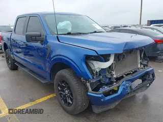 2023 Ford F-150 XL with VIN 1FTFW1E58PKD41387, listed as a IAAI auction lot 41870212 with 48,882 mi miles and . Bid and sale history available at DreamBid. Image 1.