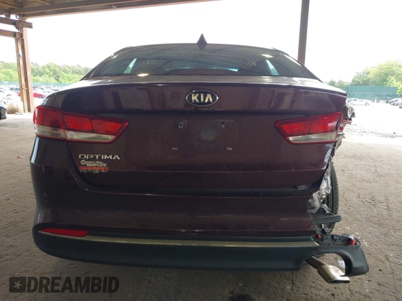 2016 Kia Optima LX with VIN 5XXGT4L32GG021055, listed as a IAAI auction lot 42424285 with 285,318 mi miles and . Bid and sale history available at DreamBid. Image 6.