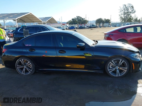 2022 BMW 3 Series 330i z VIN 3MW5R1J07N8C43380, wystawiony jako IAAI lot #41746284 z przebiegiem 60 194 mil mil oraz . Historia ofert i sprzedaży dostępna na DreamBid. Obrazek 13.