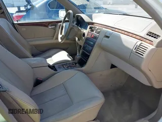 1999 Mercedes-Benz E-Class with VIN WDBJH65F7XA787254, listed as a IAAI auction lot 41884002 with 1 mi miles. Bid and sale history available at carsss.com. Image 5.