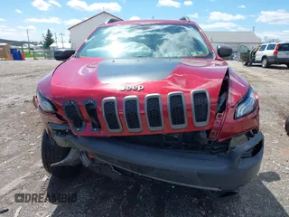 2015 Jeep Cherokee Trailhawk with VIN 1C4PJMBS0FW728361, listed as a IAAI auction lot 41978853 with 123,127 mi miles. Bid and sale history available at carsss.com. Image 12.