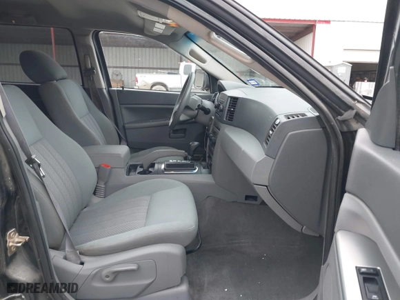 2006 Jeep Grand Cherokee Laredo with VIN 1J4GS48KX6C322538, listed as a IAAI auction lot 41282093 with 176,901 mi miles. Bid and sale history available at carsss.com. Image 5.