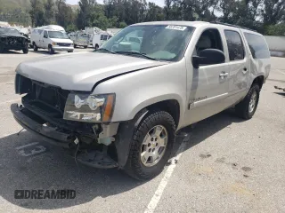 2007 Chevrolet Suburban LS with VIN 1GNFC16027J286542, listed as a Copart auction lot 56701475 with 162,156 mi miles and Salvage title. Bid and sale history available at DreamBid. Image 1.