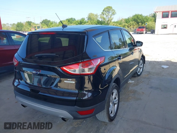 2013 Ford Escape SE with VIN 1FMCU0G99DUD53675, listed as a IAAI auction lot 38944792 with 187,801 mi miles and . Bid and sale history available at DreamBid. Image 4.