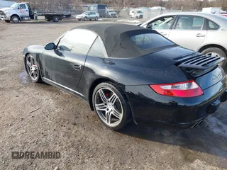 2007 Porsche 911 Carrera S z VIN WP0CB299X7S777014, wystawiony jako IAAI lot #41463577 z przebiegiem Nie podano mil oraz . Historia ofert i sprzedaży dostępna na DreamBid. Obrazek 3.