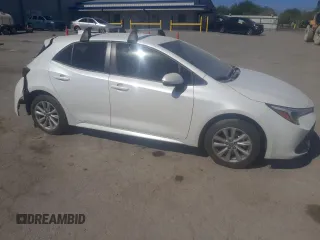 2023 Toyota Corolla Hatchback SE with VIN JTND4MBE6P3209320, listed as a Copart auction lot 69123784 with 8,252 mi miles and Salvage Title. Bid and sale history available at carsss.com. Image 4.