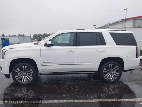 2018 GMC Yukon Denali with VIN 1GKS2CKJ8JR274087, listed as a IAAI auction lot 41097872 with 76,828 mi miles. Bid and sale history available at carsss.com. Image 15.