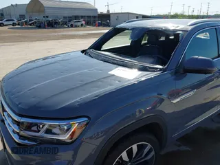 2023 Volkswagen Atlas SEL Premium R-Line z VIN 1V2FE2CA0PC224677, wystawiony jako IAAI lot #41991931 z przebiegiem 22 620 mil mil oraz . Historia ofert i sprzedaży dostępna na DreamBid. Obrazek 6.