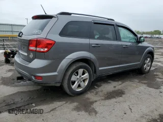 2012 Dodge Journey SXT z VIN 3C4PDDBG7CT183148, wystawiony jako Copart lot #55614685 z przebiegiem 182 263 mil mil oraz Szkoda całkowita • Salvage title. Historia ofert i sprzedaży dostępna na DreamBid. Obrazek 3.