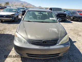 2003 Toyota Camry LE z VIN 4T1BF32K93U566965, wystawiony jako Copart lot #71979144 z przebiegiem 267 228 mil mil oraz Szkoda całkowita • Salvage title. Historia ofert i sprzedaży dostępna na DreamBid. Obrazek 5.