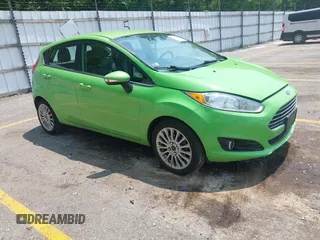 2014 Ford Fiesta Titanium z VIN 3FADP4FJ7EM203322, wystawiony jako IAAI lot #42448840 z przebiegiem 91 901 mil mil oraz . Historia ofert i sprzedaży dostępna na DreamBid. Obrazek 1.