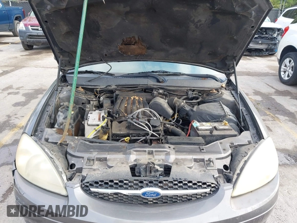 2003 Ford Taurus SE Standard with VIN 1FAFP58U63G117125, listed as a IAAI auction lot 42061812 with 172,154 mi miles. Bid and sale history available at carsss.com. Image 10.