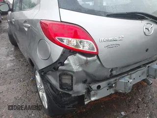 2011 Mazda 2 Sport with VIN JM1DE1HY1B0127409, listed as a IAAI auction lot 42015727 with 154,385 mi miles. Bid and sale history available at carsss.com. Image 6.