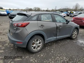2018 Mazda CX-3 Sport z VIN JM1DKFB77J0312732, wystawiony jako Copart lot #45720065 z przebiegiem 99 866 mil mil oraz Szkoda całkowita • Salvage title. Historia ofert i sprzedaży dostępna na DreamBid. Obrazek 3.