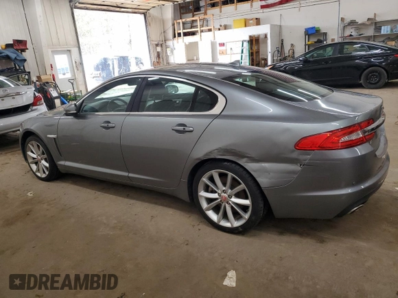 2015 Jaguar XF Portfolio with VIN SAJWJ0FF8F8U65883, listed as a Copart auction lot 55783945 with 133,431 mi miles and Salvage Title. Bid and sale history available at DreamBid. Image 2.