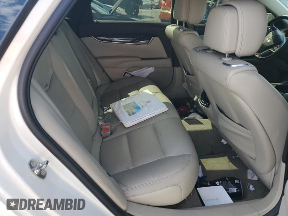 2014 Cadillac XTS Premium with VIN 2G61P5S36E9305491, listed as a Copart auction lot 44404425 with 104,710 mi miles and Salvage Title. Bid and sale history available at DreamBid. Image 10.
