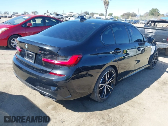 2021 BMW 3 Series M340i xDrive with VIN 3MW5U9J0XM8B49022, listed as a IAAI auction lot 41637152 with 65,452 mi miles. Bid and sale history available at carsss.com. Image 4.