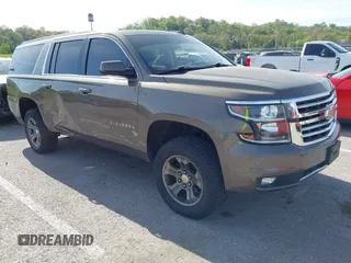 2016 Chevrolet Suburban LT z VIN 1GNSKHKC2GR289761, wystawiony jako IAAI lot #42086912 z przebiegiem 247 791 mil mil oraz . Historia ofert i sprzedaży dostępna na DreamBid. Obrazek 1.