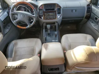 2002 Mitsubishi Montero Limited z VIN JA4MW51R12J020808, wystawiony jako Copart lot #41915255 z przebiegiem 127 834 mil mil oraz Czysty tytuł • Clean title. Historia ofert i sprzedaży dostępna na DreamBid. Obrazek 8.