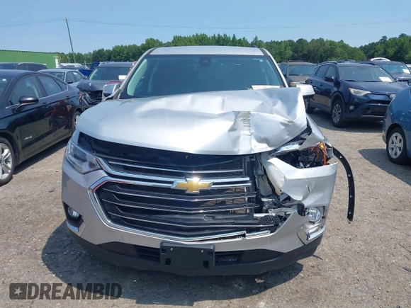 2020 Chevrolet Traverse LT Cloth with VIN 1GNEVGKW7LJ273511, listed as a IAAI auction lot 42366967 with 60,272 mi miles and . Bid and sale history available at DreamBid. Image 12.