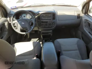 2003 Ford Escape XLS Popular z VIN 1FMYU02133KE09143, wystawiony jako Copart lot #53659105 z przebiegiem 78 736 mil mil oraz Szkoda całkowita • Salvage title. Historia ofert i sprzedaży dostępna na DreamBid. Obrazek 8.