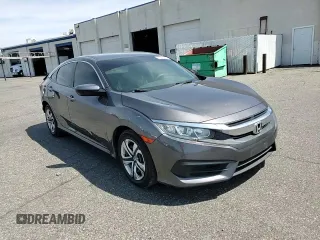 2017 Honda Civic LX with VIN 2HGFC2F5XHH539976, listed as a Copart auction lot 60558865 with 79,519 mi miles and Salvage title. Bid and sale history available at DreamBid. Image 14.