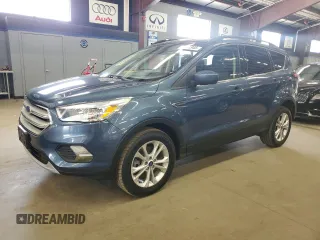 2018 Ford Escape SE z VIN 1FMCU9GD1JUB29403, wystawiony jako Copart lot #59541945 z przebiegiem 144 478 mil mil oraz Czysty tytuł • Clean title. Historia ofert i sprzedaży dostępna na DreamBid. Obrazek 1.
