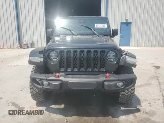 2022 Jeep Wrangler Unlimited Rubicon with VIN 1C4HJXFG1NW193437, listed as a Copart auction lot 57137365 with 56,732 mi miles and Salvage title. Bid and sale history available at DreamBid. Image 5.