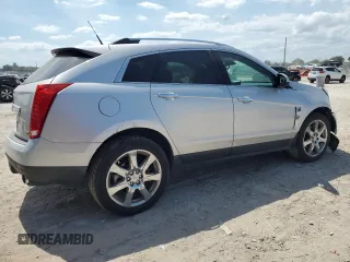 2012 Cadillac SRX Performance Collection z VIN 3GYFNBE34CS512362, wystawiony jako Copart lot #57406495 z przebiegiem 102 226 mil mil oraz Szkoda całkowita • Salvage title. Historia ofert i sprzedaży dostępna na DreamBid. Obrazek 3.