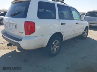 2005 Honda Pilot EX-L with NAVI with VIN 2HKYF18775H571312, listed as a IAAI auction lot 41830609 with 297,923 mi miles. Bid and sale history available at carsss.com. Image 4.