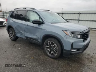 2023 Honda Passport Elite with VIN 5FNYF8H01PB015218, listed as a Copart auction lot 87325194 with 13,277 mi miles and Salvage title. Bid and sale history available at DreamBid. Image 4.