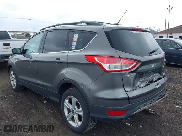2013 Ford Escape SE with VIN 1FMCU9GX4DUB35629, listed as a IAAI auction lot 42446685 with 103,420 mi miles and . Bid and sale history available at DreamBid. Image 3.