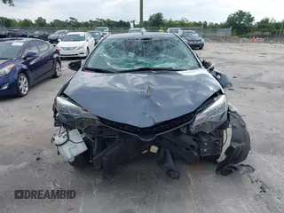 2018 Toyota Corolla L with VIN 5YFBURHE1JP814781, listed as a IAAI auction lot 42408378 with 115,543 mi miles and . Bid and sale history available at DreamBid. Image 13.