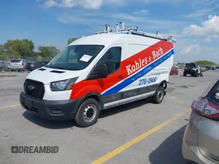 2023 Ford Transit Cargo with VIN 1FTBR1C80PKA43077, listed as a IAAI auction lot 40182475 with 15,656 mi miles and . Bid and sale history available at DreamBid. Image 2.