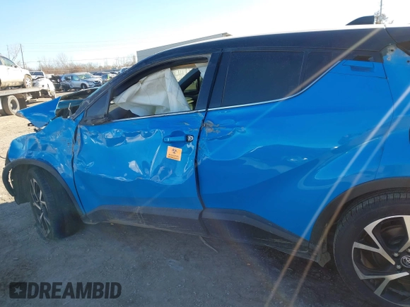 2019 Toyota C-HR XLE with VIN JTNKHMBX9K1056627, listed as a IAAI auction lot 41030089 with 1 mi miles. Bid and sale history available at carsss.com. Image 13.