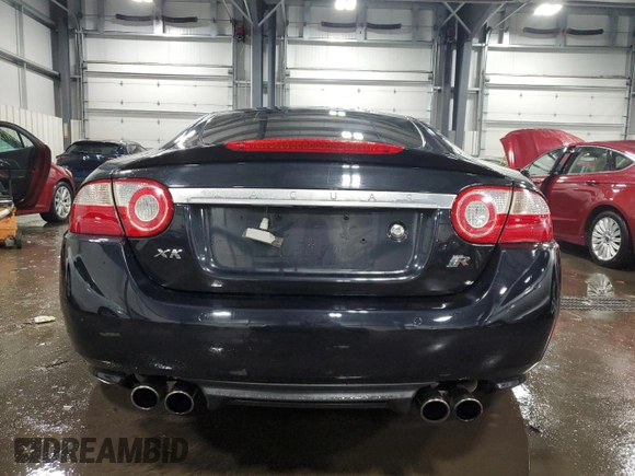 2007 Jaguar XK with VIN SAJWA43C479B18700, listed as a Copart auction lot 83377684 with 143,746 mi miles and Salvage Title. Bid and sale history available at carsss.com. Image 6.