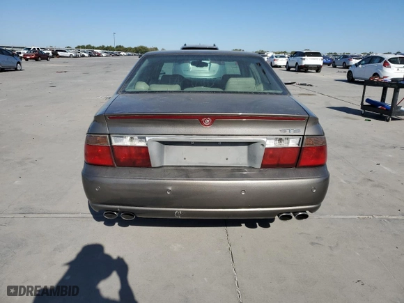 2003 Cadillac Seville Luxury SLS with VIN 1G6KS54Y93U279660, listed as a Copart auction lot 75961404 with 107,591 mi miles and Salvage Title. Bid and sale history available at carsss.com. Image 6.