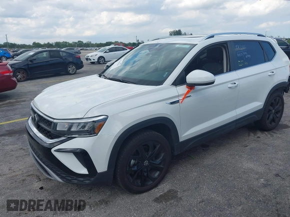 2024 Volkswagen Taos SE z VIN 3VVEX7B26RM128537, wystawiony jako IAAI lot #42344341 z przebiegiem 8 723 mil mil oraz . Historia ofert i sprzedaży dostępna na DreamBid. Obrazek 18.
