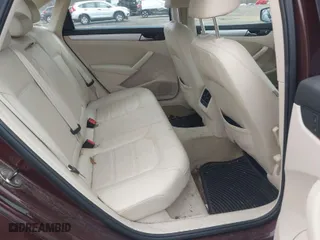 2013 Volkswagen Passat SE w/Sunroof with VIN 1VWBP7A32DC057999, listed as a IAAI auction lot 42040398 with 79,087 mi miles. Bid and sale history available at carsss.com. Image 8.